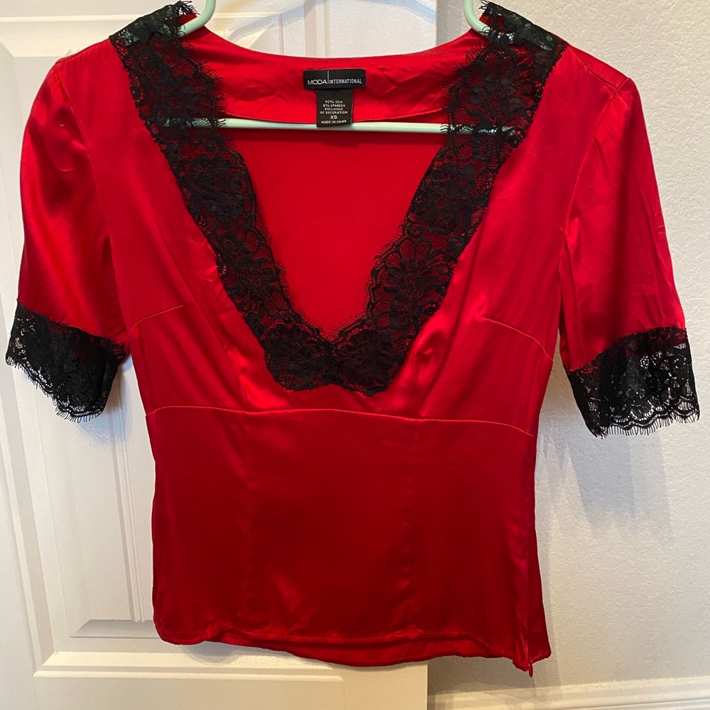 Silk, deep V neck, very sexy blouse.